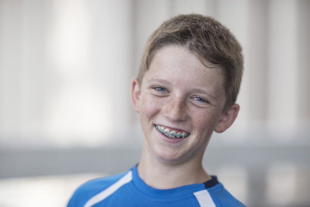 Portrait of smiling boy with braces